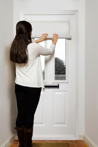 with removable self-adhesive attachments easydoor blind for glazed doors 